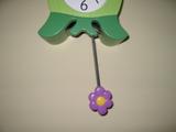 Plastic flower on a pendulum