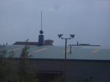 Rooftop spheres skewered on sticks